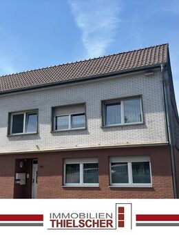 Attraktives Mehrfamilienhaus - Kapitalanlage mit drei Wohneinheiten und neun Garagen - Übach-Palenberg