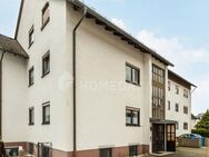 In kleinem, ruhigen MFH: Große gepflegte EG-Wohnung mit SW-Balkon, WC, Garage und Garten - Schwalbach (Taunus)