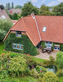 Familienidylle mit Charme - Großzügiges Einfamilienhaus mit Traumgarten in ruhiger Sackgassenlage - Brunsbüttel