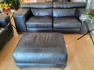 2 Natuzzi Sofas mit Hocker, schwarz - Selm