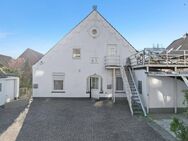 Vielseitiges 3-Parteienhaus in zentraler Lage von Stuhr-Brinkum - Stuhr