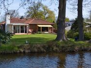 Außergewöhnlich ruhiges Wohnen, direkt am See - Walmdachbungalow mit Keller in guter Nachbarschaft! - Seevetal