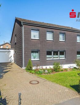 Freistehendes Zweifamilienhaus mit großem Grundstück und mehreren Garagen in ruhiger Seitenstraße - Roetgen (Tor zur Eifel)