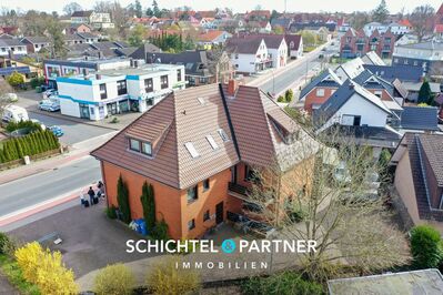 Verden - Achim | Großzügiges Mehrfamilienhaus mit zwei Gewerbeeinheiten, Keller und Stellplätzen