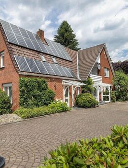 Freistehendes Haus mit Garagen und zusätzlichem (Baugrundstück) in begehrter Lage in Uelsen - Uelsen