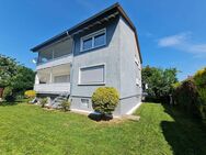 Freistehendes Zweifamilienhaus mit ausgebautem Keller und großem Grundstück in Erlensee - Erlensee