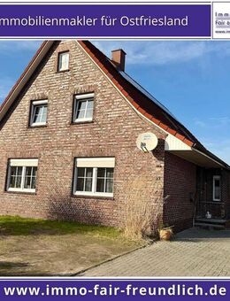 Einfamilienhaus mit Kaminofen, großem Grundstück und Doppelgarage in Aurich Egels - Aurich