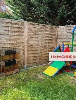 IMMOBERLIN.DE - Familienfreundliche Wohnung mit Südwestterrasse, Garten & Tiefgaragenstellplatz - Hohen Neuendorf