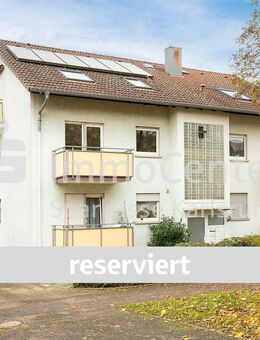 Investition mit Perspektive: Sanierungsbedürftige Wohnung mit 2 Balkonen und Garage in Wolfartsweier - Karlsruhe