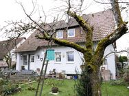 Charmantes, freistehendes Einfamilienhaus mit großem Garten und zwei Garagen - Aspach