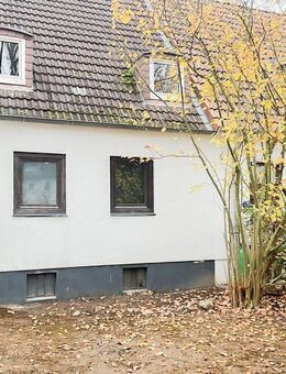 Charmantes Mittelreihenhaus mit malerischem Garten - Modernisierungspotenzial in Top-Lage - Reinbek