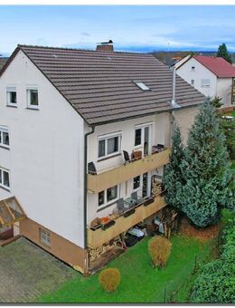 Dreifamilienhaus mit frei werdender Wohnung in beliebter Lage von Kaufungen - Kaufungen