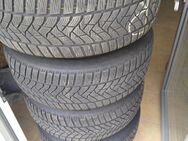 4 x Dunlop Winterreifen 205/55 R16 91H auf 5 Loch-Stahlfelgen 6Jx16H2 ET50 für VW - Volxheim