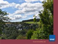 Baugrund mit tollem Blick über den Ort direkt am Waldrand! Altbestand vorhanden. - Weilrod