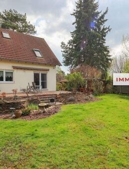 IMMOBERLIN.DE - Adrettes Einfamilienhaus mit Gartenidylle in familiärer Lage - Berlin