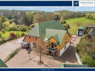 Großzügiges Mehrfamilienhaus mit Garten, Wintergarten und Garagen - Hohenfelde (Landkreis Plön)
