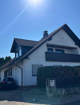 Attraktives Zweifamilienhaus mit großem Garten, Garage und viel Potenzial - Nidderau