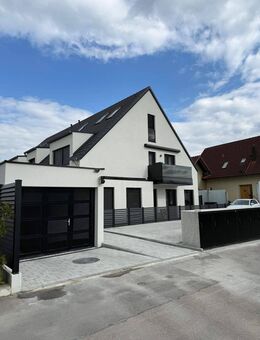 Moderne, energieeffiziente Erdgeschosswohnung mit hochwertiger Küche, 2 Zimmern, Terrasse und Garten - Perfekt zum Entspannen! - Manching