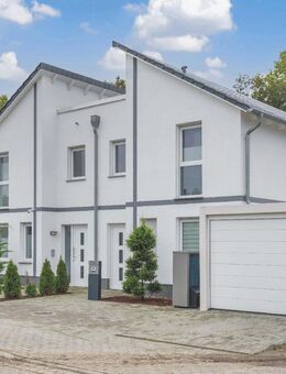 "Moderne Kapitalanlage: Zwei energieeffiziente Wohnhälften mit Garage auf 420m² Grundstück" - Wolmirstedt