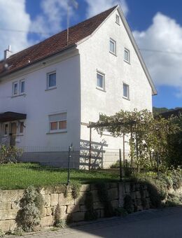 Doppelhaushälfte und hälftiger Miteigentumsanteil an Kellerhütte - Auenwald