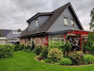 Perfektes Familienidyll: Gepflegtes Einfamilienhaus mit Traumgarten und Garage - Mechernich