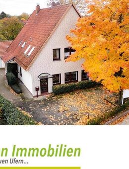 Gut und zentral gelegenes Zweifamilienhaus mit Gewerbeeinheit, Garage und großen Garten - Bremen