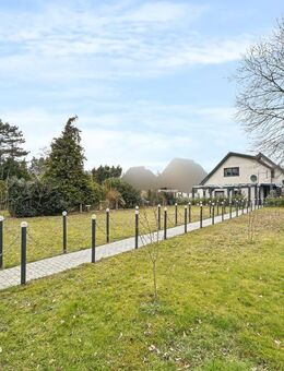 Attraktives Einfamilienhaus mit Einliegerwohnung-viel Platz für Ihre Wohnträume in Osnabrück Fledder - Osnabrück