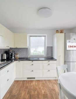 IMMOBERLIN.DE - Entzückender Bungalow mit Gartenidylle & Wintergarten im Berliner Speckgürtel - Blankenfelde-Mahlow