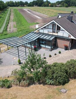 Charmantes Doppelhaus mit Einfamilienhaus Charakter und Wohnmobilcarport - Dötlingen