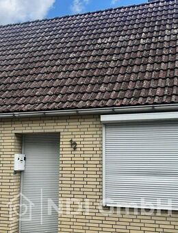 Einfamilienhaus mit großem Grundstück, Garagen und Entwicklungspotenzial in Uetersen - Uetersen