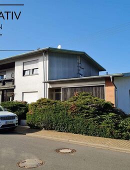 Großes Areal mit 480 m² Wohnhaus Ein-Dreifamilien und 2 Lagerhallen in ruhiger Lage von Urexweiler - Marpingen