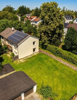 Grünwald: Doppelhaushälfte mit großem Garten - stark sanierungsbedürftig, viel Potenzial - Grünwald