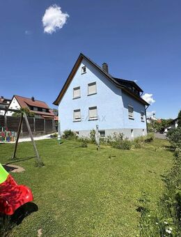 Charmantes Ein- bis Zweifamilienhaus mit großem Grundstück und Doppelgarage in ruhiger Lage - Birenbach