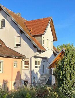 Attraktive und familienfreundliche 4-Zimmer-Wohnung in ruhiger Lage mit eigenem Garten und Garage - Rattelsdorf (Bayern)