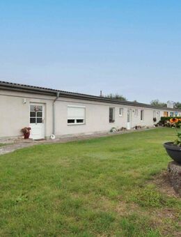 Attraktives Kapitalanlageobjekt: Mehrfamilienhaus mit Gewerbeeinheit und solider Rendite - Garz (Rügen)