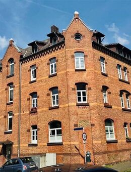 Charaktervolles Mehrfamilienhaus mit Backsteinfassade in Kassel-Wahlershausen - Kassel