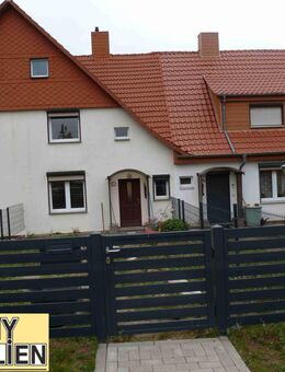 Reihenmittelhaus, drei Garagen und attraktiven Grundstück in gefragter Lage - Harztor