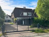 Große Doppelhaushälfte mit norwegischem Holzhaus - Norderstedt