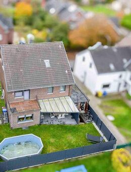 Gepflegtes Einfamilienhaus samt Garten zzgl. 54 qm Gewerbeeinheit, Garage und Stellplatz in Waldniel - Schwalmtal (Nordrhein-Westfalen)