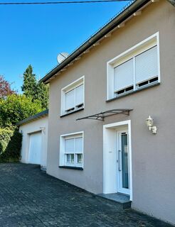 Einfamilienhaus in Top Lage, mit Garage zu verkaufen