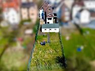 RESERVIERT! Arnsberg-Hüsten: Vermietetes 3-Familien-Haus mit Garagen und Garten - Arnsberg