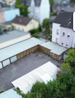 SCHADE IMMOBILIEN - 19 Garagen! - Zweifamilienhaus in zentraler Lage von Lüdenscheid zu verkaufen! - Lüdenscheid
