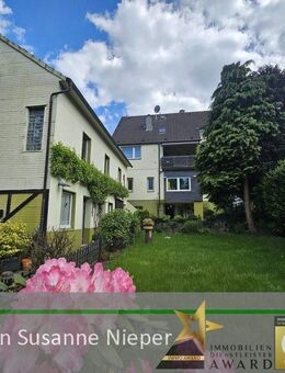 Vielseitig nutzbare Liegenschaft – Attraktives Mehrfamilienhaus mit Garten und separatem Gewerbehaus - Solingen (Klingenstadt)