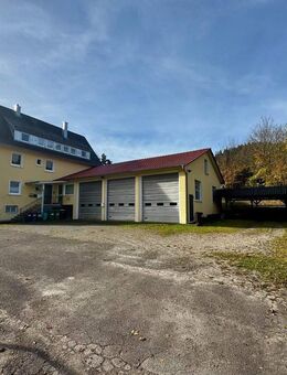 Renditestarkes 3-Parteienhaus mit Großgaragen - Enzklösterle