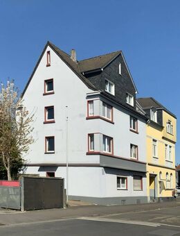 Solide Kapitalanlage: Mehrfamilienhaus mit vier Wohneinheiten und Gewerbe in Gräfrath - Solingen (Klingenstadt)
