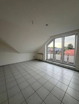 Gemütliche 3-Zimmer-Dachgeschosswohnung mit Balkon - Cloppenburg