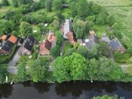 VERKAUFT - Wohnhaus mit Scheune und großem Grundstück in idyllischer Kanallage zu verkaufen! - Emden