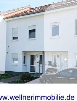 SOLIDE KAPITALANLAGE IN GEFRAGTER LAGE! Reihenmittelhaus mit kleinem Garten und Carport in Randlage von Lübbecke - Lübbecke