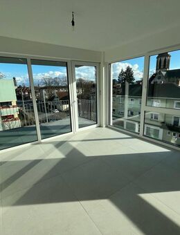 Großartig: Neubauwohnung mit EBK, Aufzug, Balkon & TG-Stellplatz - Ginsheim-Gustavsburg
