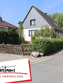solides Einfamilienhaus mit Keller auf großem Eckgrundstück mit Bebauungsmöglichkeit in Halstenbek - Halstenbek